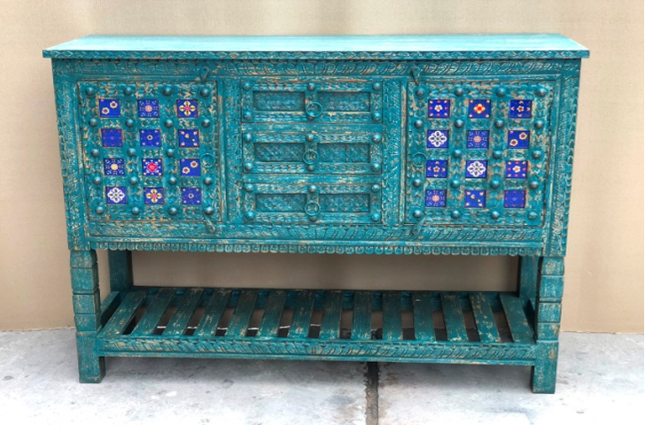Original hand-carved deep teal sideboard with ceramic tile inlays and iron ring pulls