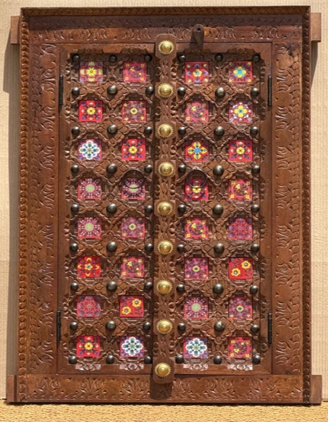 Original copper brown double-door wall panel with pink glass tiles and octagonal frames