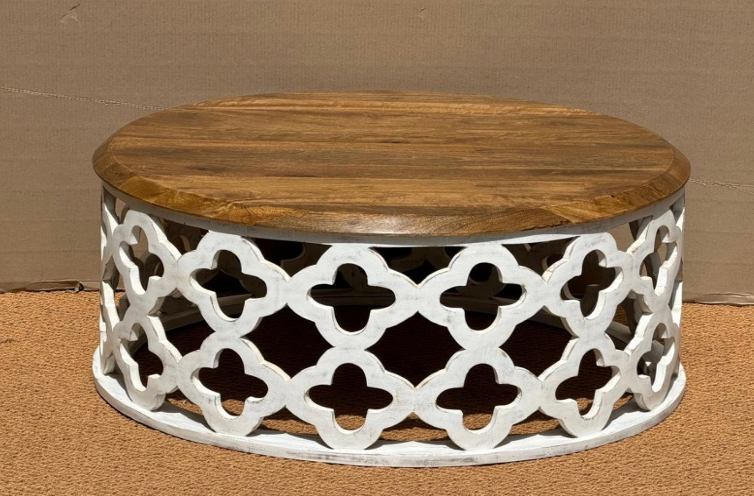Round mango wood drum coffee table with natural wood top and antique white Moroccan quatrefoil lattice base