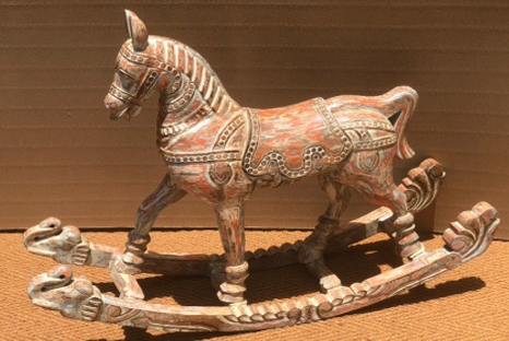 Original hand-carved polychrome decorative rocking horse with elephant head rockers