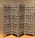 Hand-carved whitewash architectural grid four-panel room divider with alternating solid carved and open jali sections