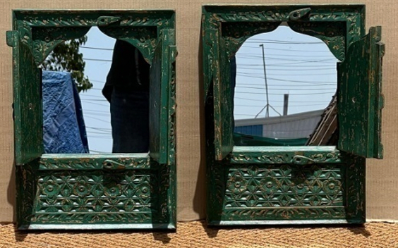 Pair of hand-carved green Moroccan Jharokha window mirrors open revealing mirror glass within
