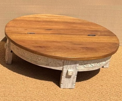 Hand-carved chowki low floor table with round dark walnut mango wood top and whitewash carved apron frieze and legs