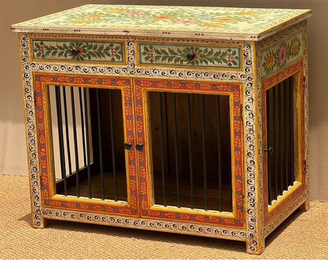 Hand-painted Rajasthani mango wood dog kennel and side table with ivory spiral curl vine frame, terracotta-orange floral border panels and lush full-width garden scene painted top