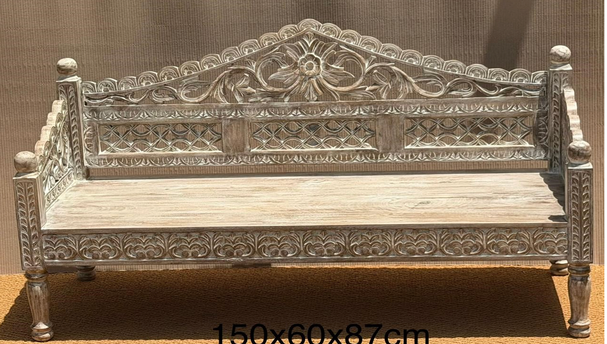 Hand-carved mango wood daybed bench in whitewash silver-grey distressed finish with arched flower medallion backrest crest, three diamond lattice fretwork panels, acanthus frieze, carved fleur-de-lis apron and turned column legs with ball finials