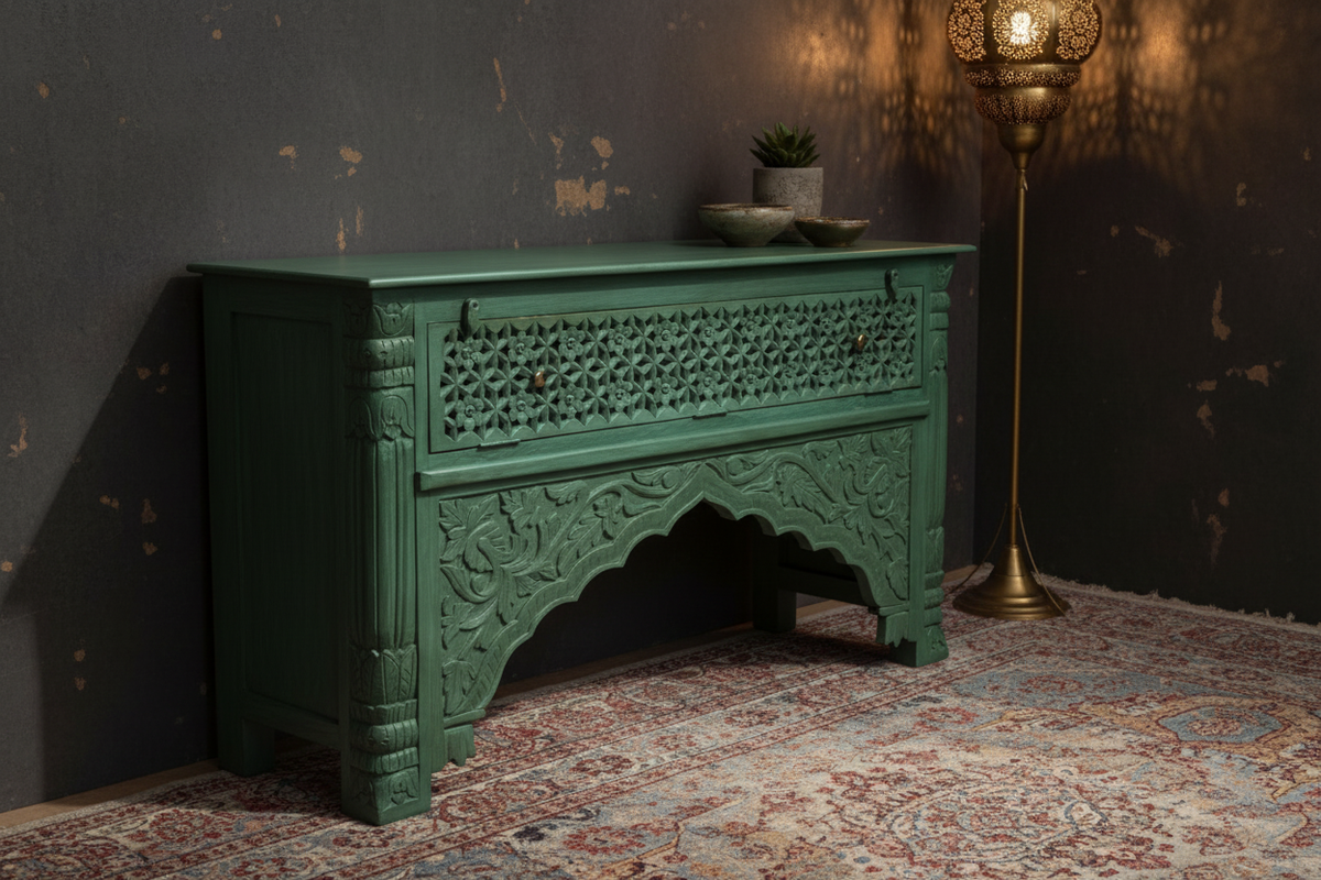 Hand-carved sage green console table – moody Moroccan-inspired room
