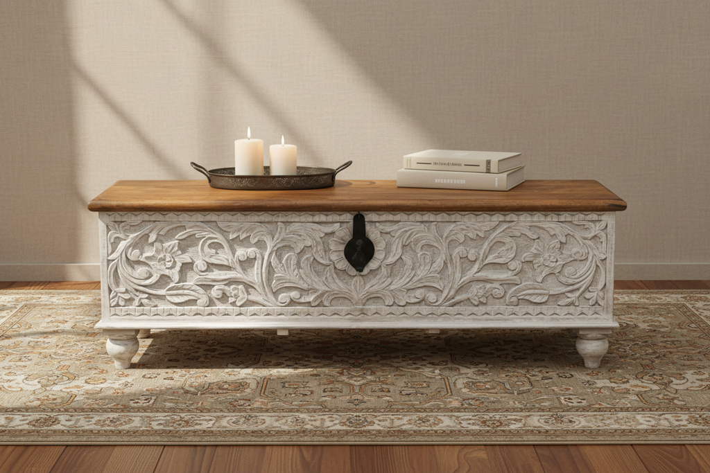 Hand-carved whitewash storage trunk – front hero as coffee table in warm living room
