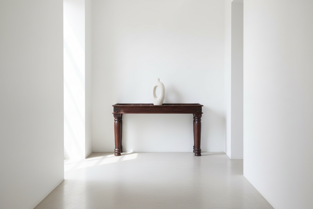 Blue Pottery console table – minimalist white corridor with single sculptural object
