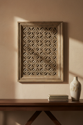 Antique grey-silver framed jali wall panel – above console on neutral plaster wall