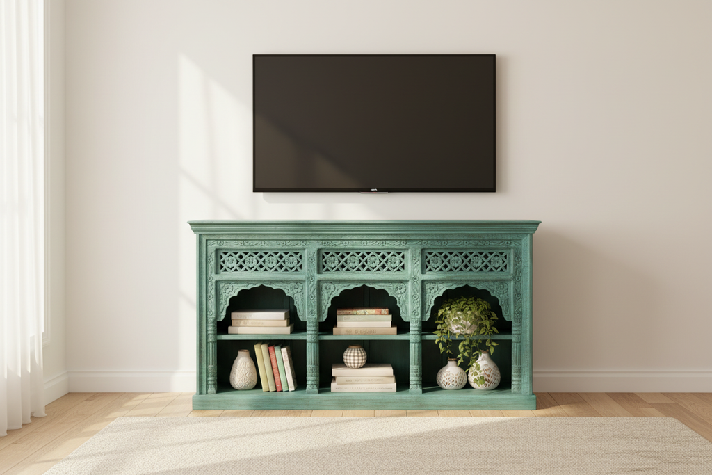 Hand-carved turquoise triple arch media console – styled as TV unit in bright living room