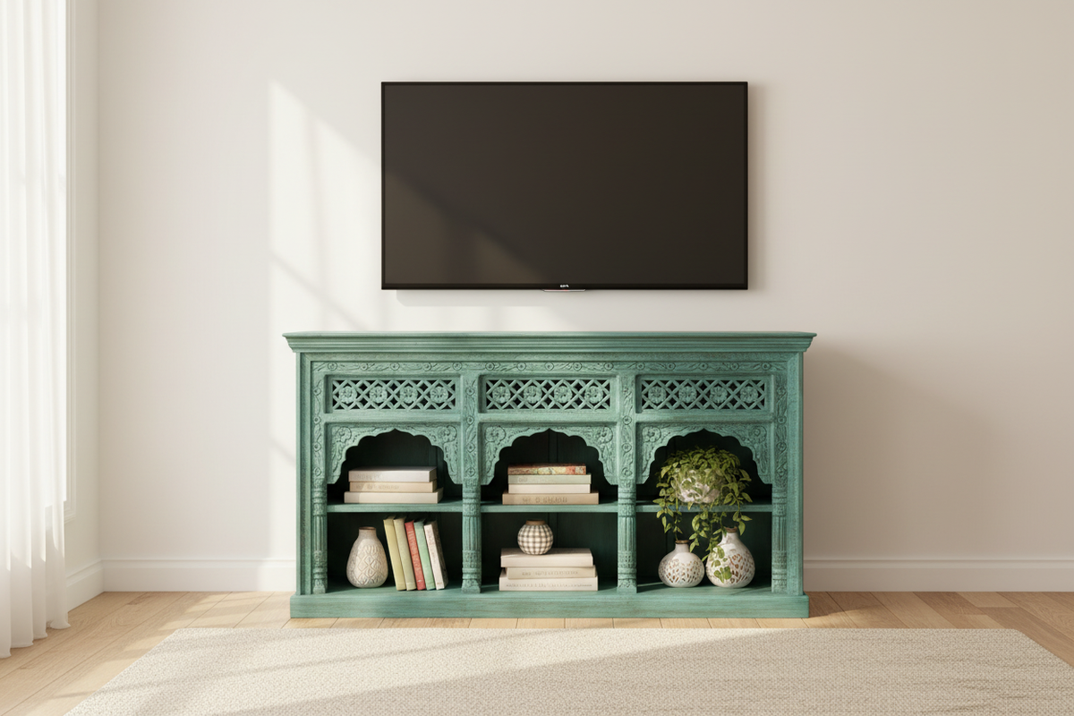 Hand-carved turquoise triple arch media console – styled as TV unit in bright living room