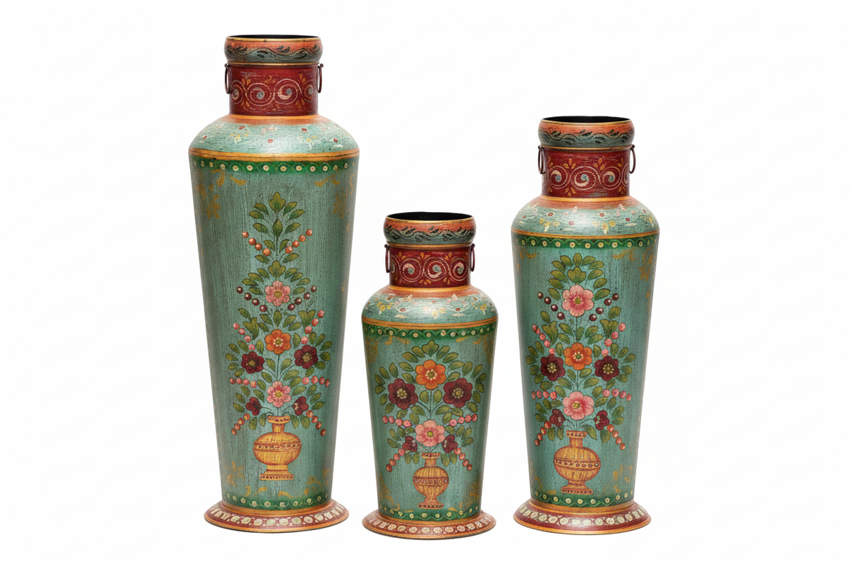 Three teal floral metal floor vases on white background