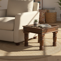 Blue Pottery tile-top side table – hero beside linen armchair in bohemian living room