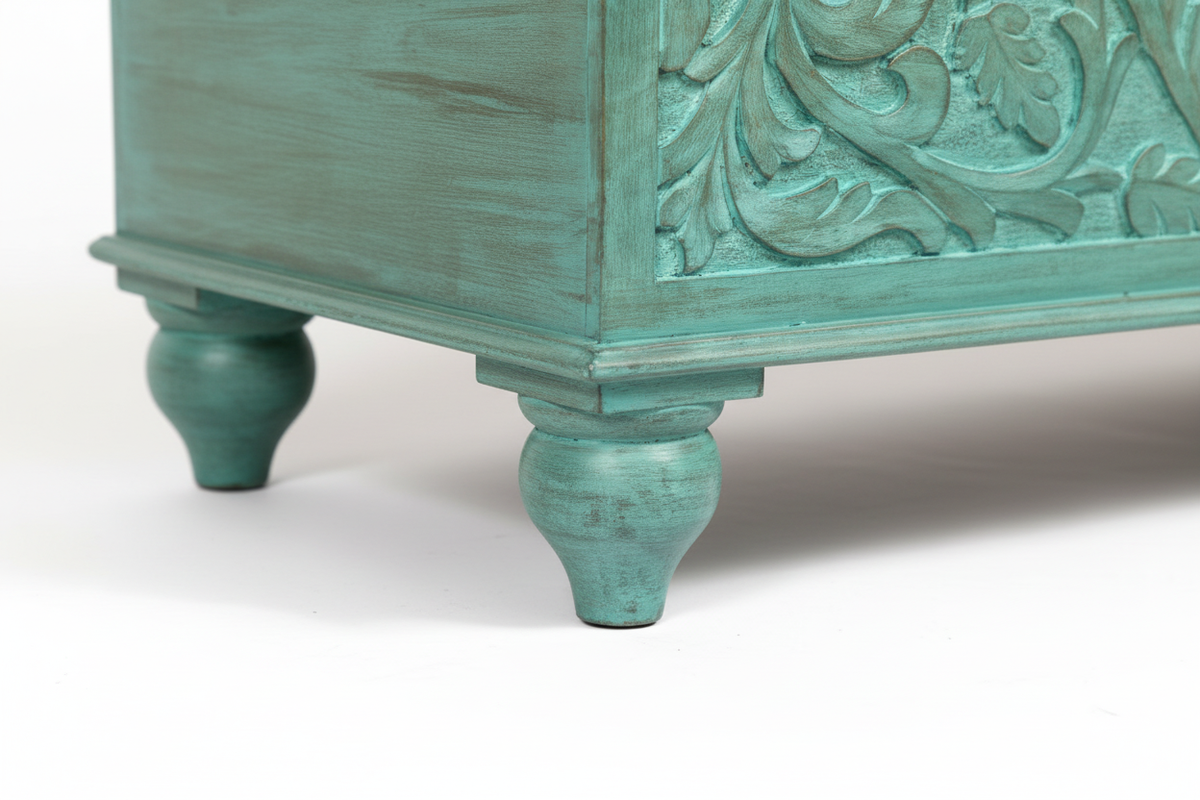 Hand-carved turquoise mango wood storage trunk – ball-turned feet detail white background