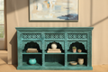 Hand-carved turquoise triple arch media console – front hero in warm living room