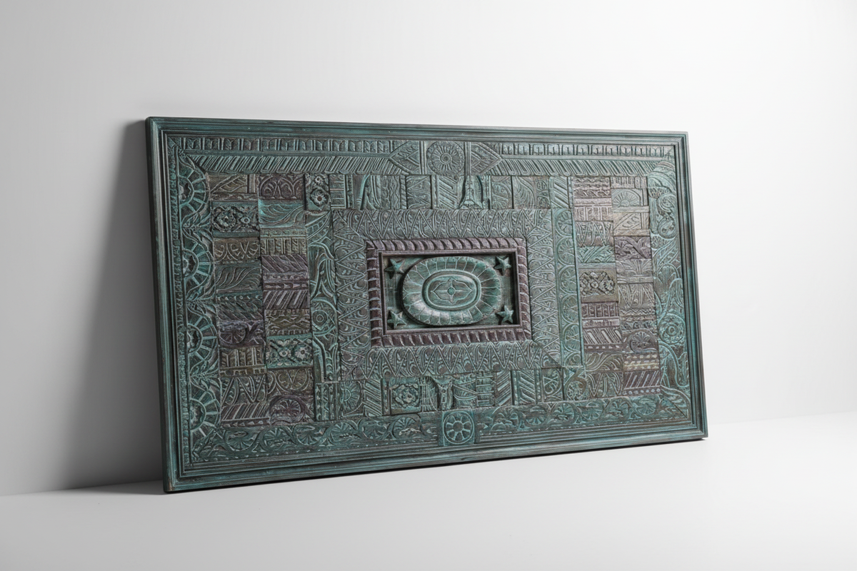 Teal carved wall panel – leaning with raking light white background