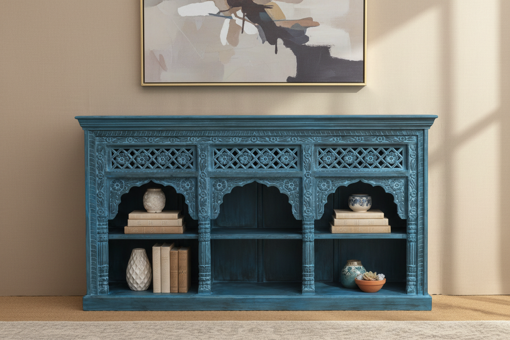 Hand-carved cobalt blue triple arch media console – front hero in warm living room