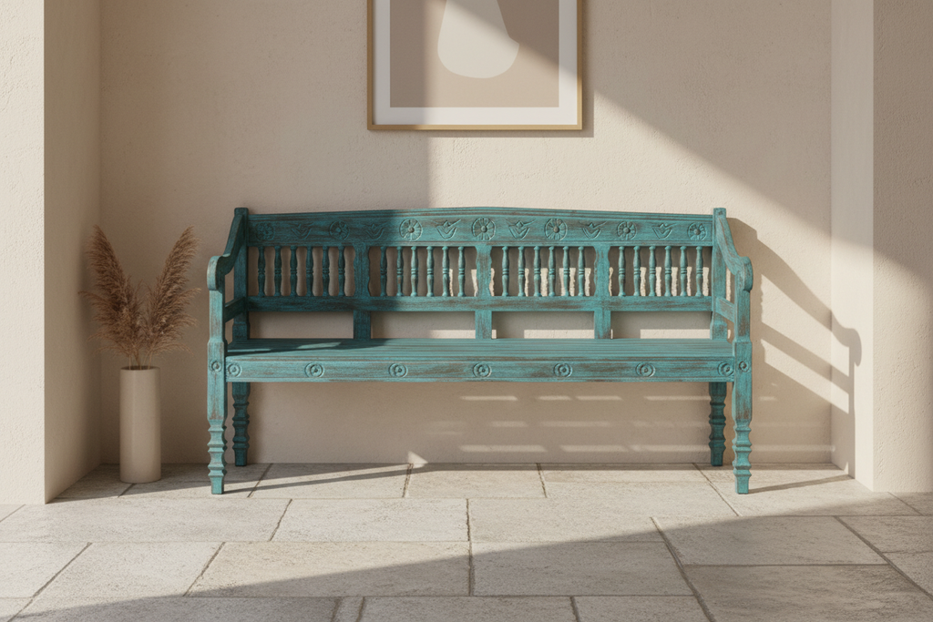 Hand-carved turquoise mango wood bench – front hero in warm entryway