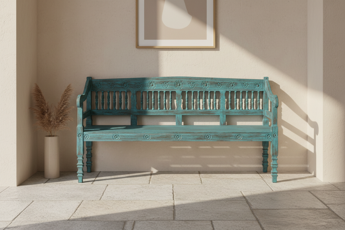 Hand-carved turquoise mango wood bench – front hero in warm entryway