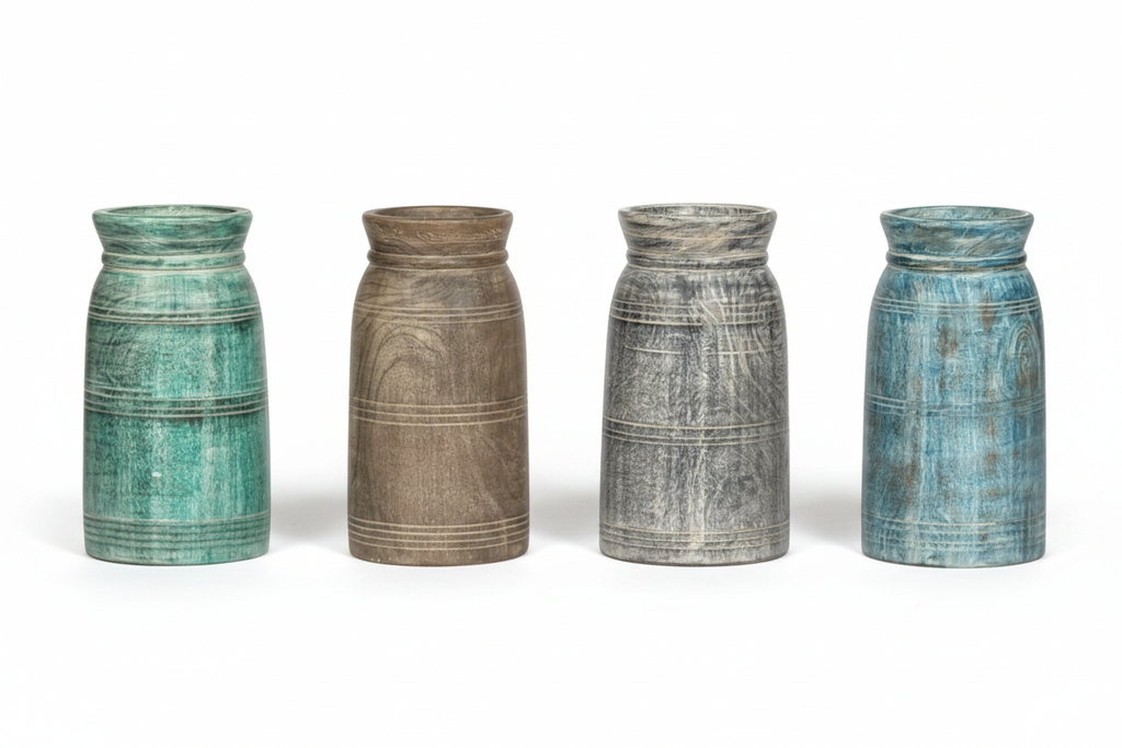 Four distressed wood vases in a row – white background