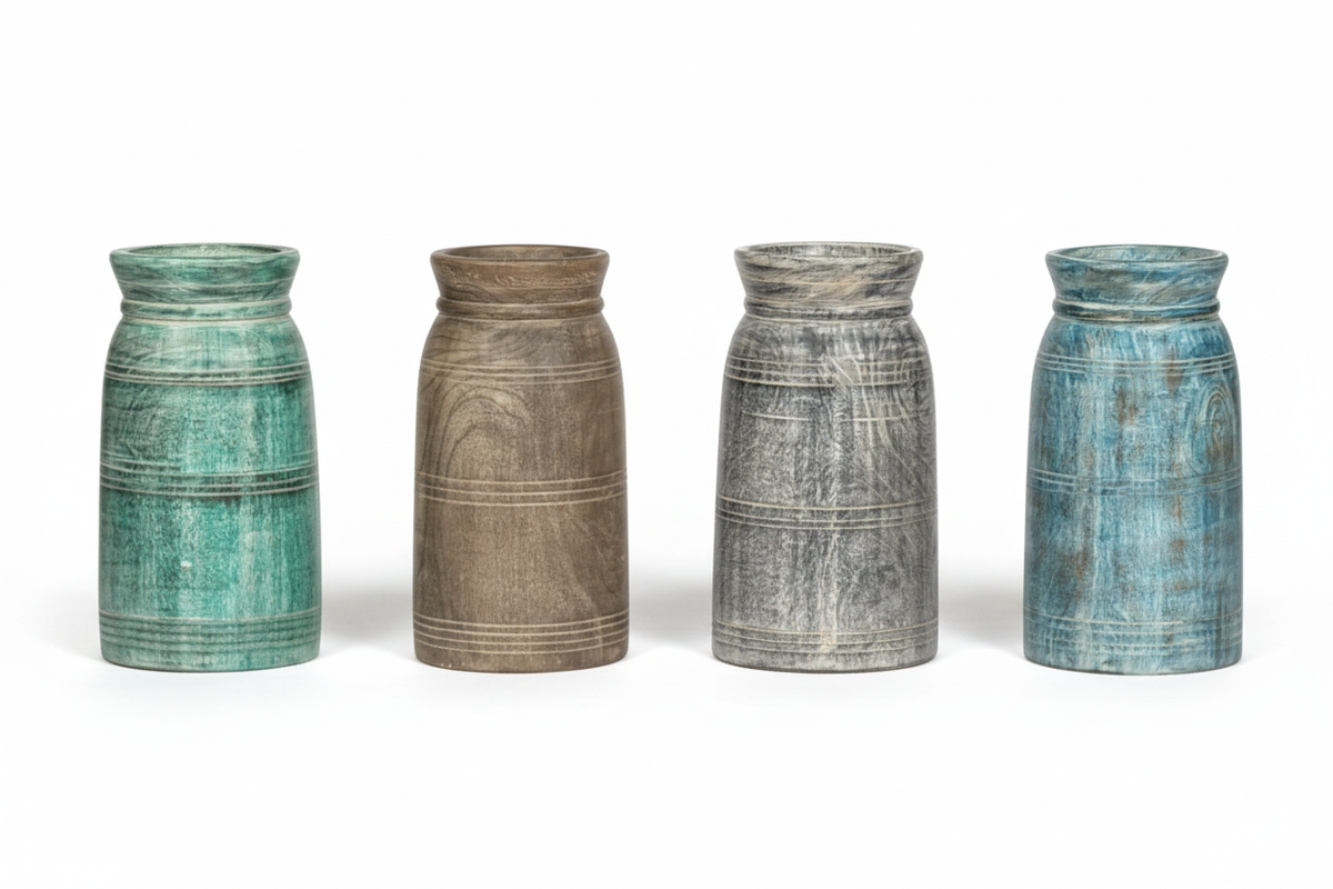 Four distressed wood vases in a row – white background