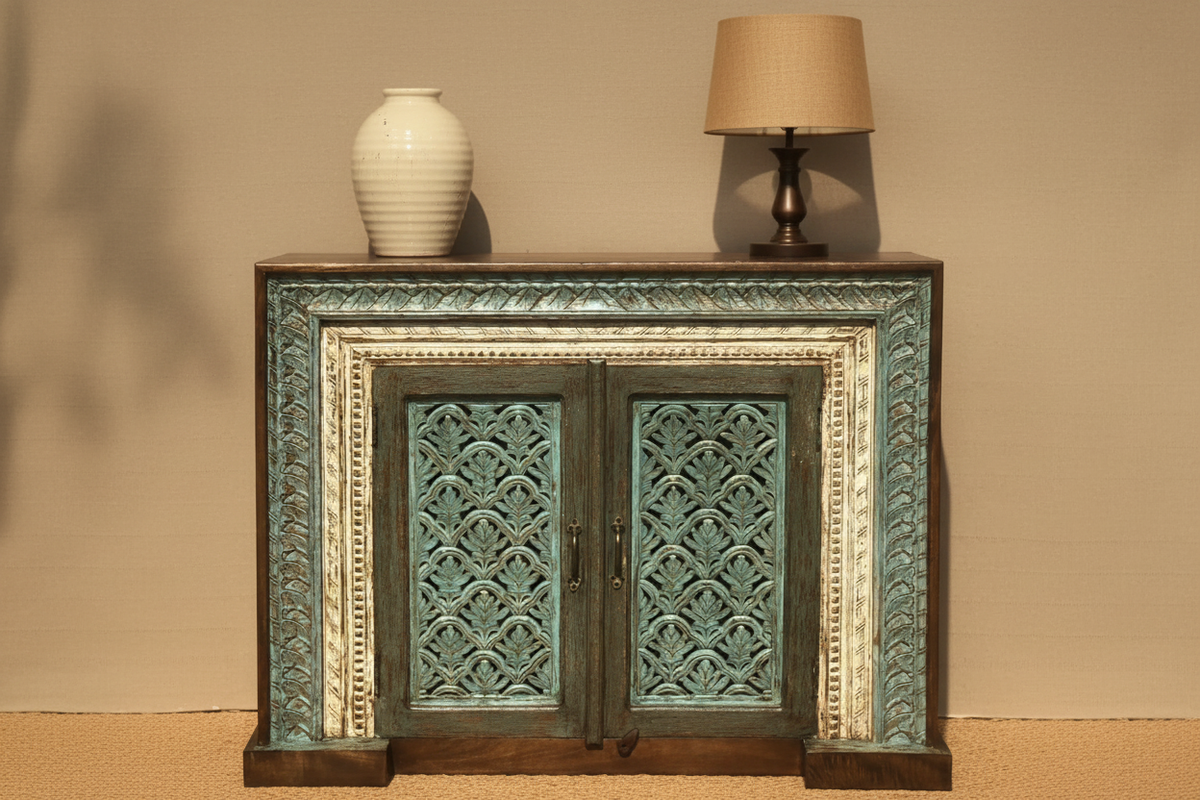 Hand-carved teal sideboard cabinet – hero front view in warm living room