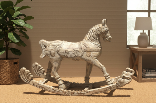 Hand-carved antique whitewash rocking horse – side profile in warm living room
