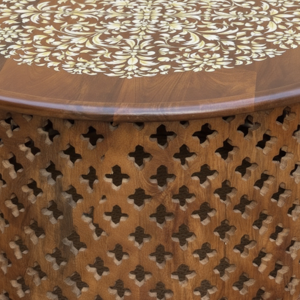 Close-up of bone inlay floral scroll medallion top and Moroccan quatrefoil lattice base detail