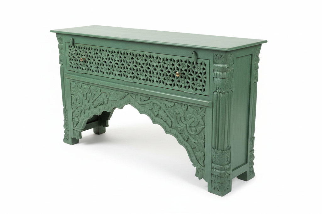 Hand-carved sage green console table – elevated three-quarter white background