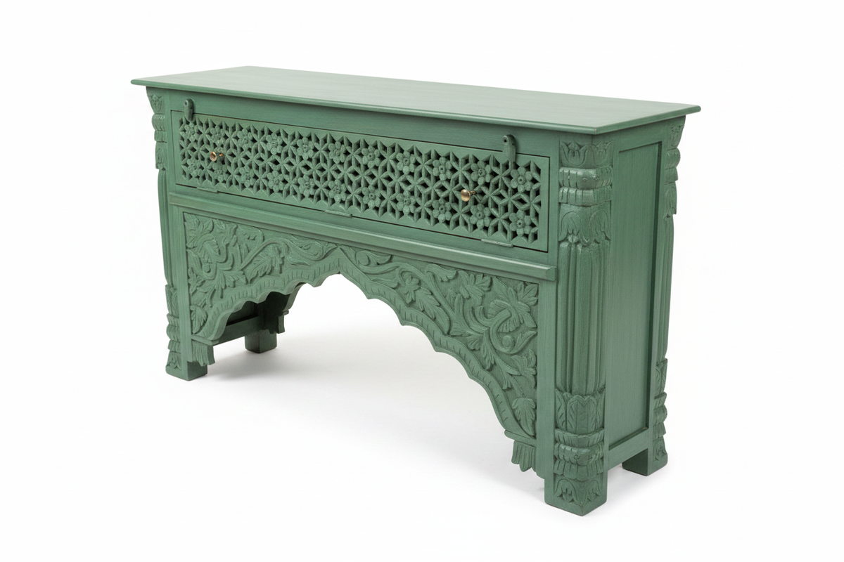 Hand-carved sage green console table – elevated three-quarter white background